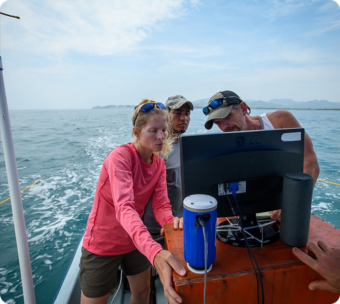 Field team preparing marine survey equipment